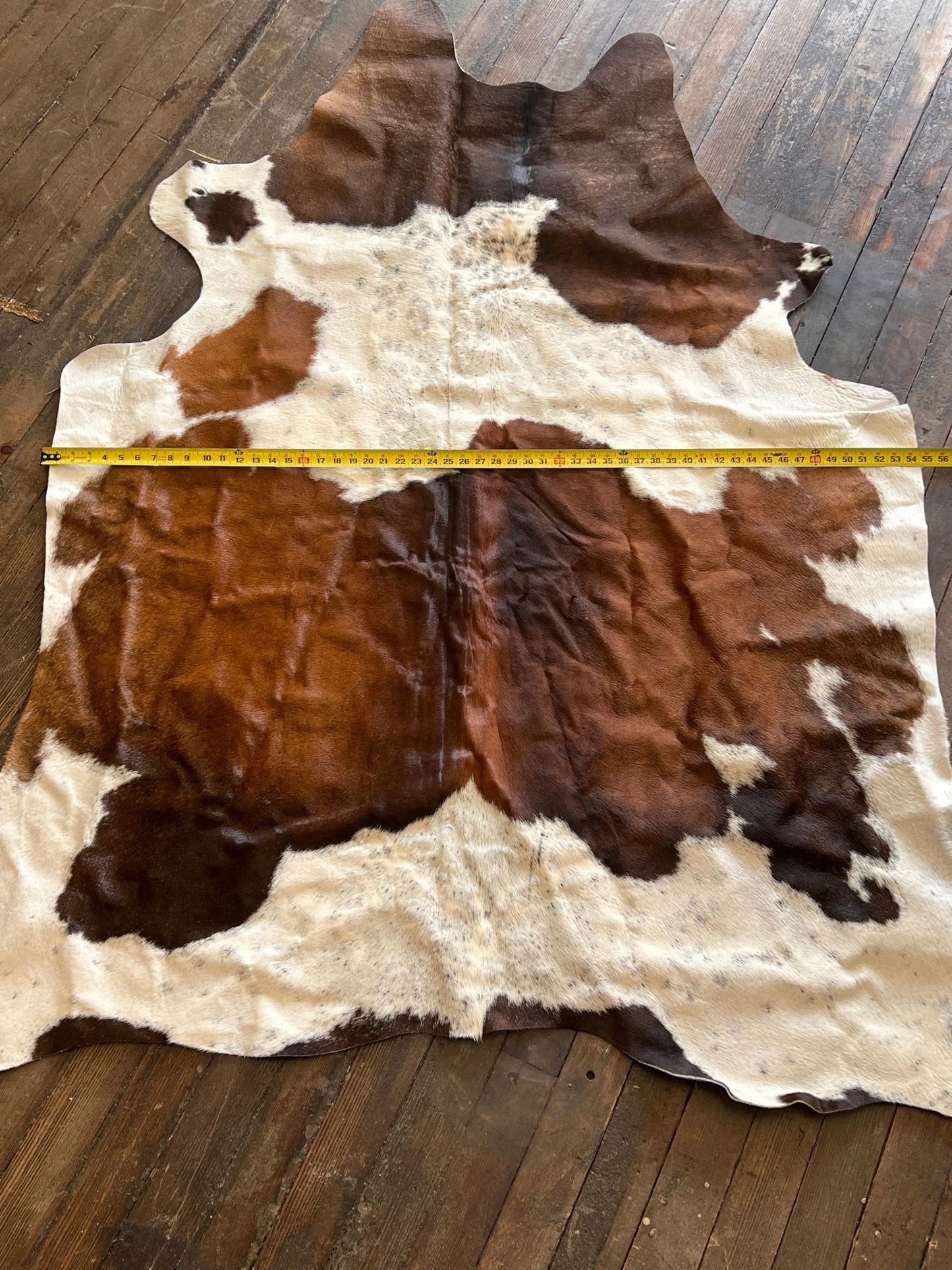 Cowhide Rug - 6.5 ft by 4.5 ft.