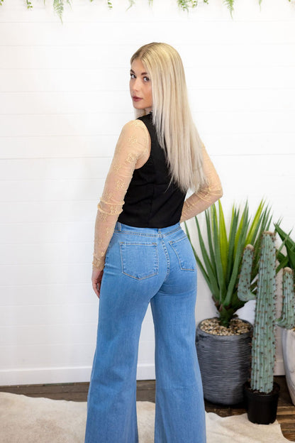 O2 Denim Front Seam Wide-Leg Western Jeans — Light Wash Mid-Rise Flare with Raw Hem & Front Seam Detail