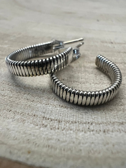Elaine Tahe Navajo Sterling Silver Hoop Earrings — 5/8" × 1/8" (Listing #1)