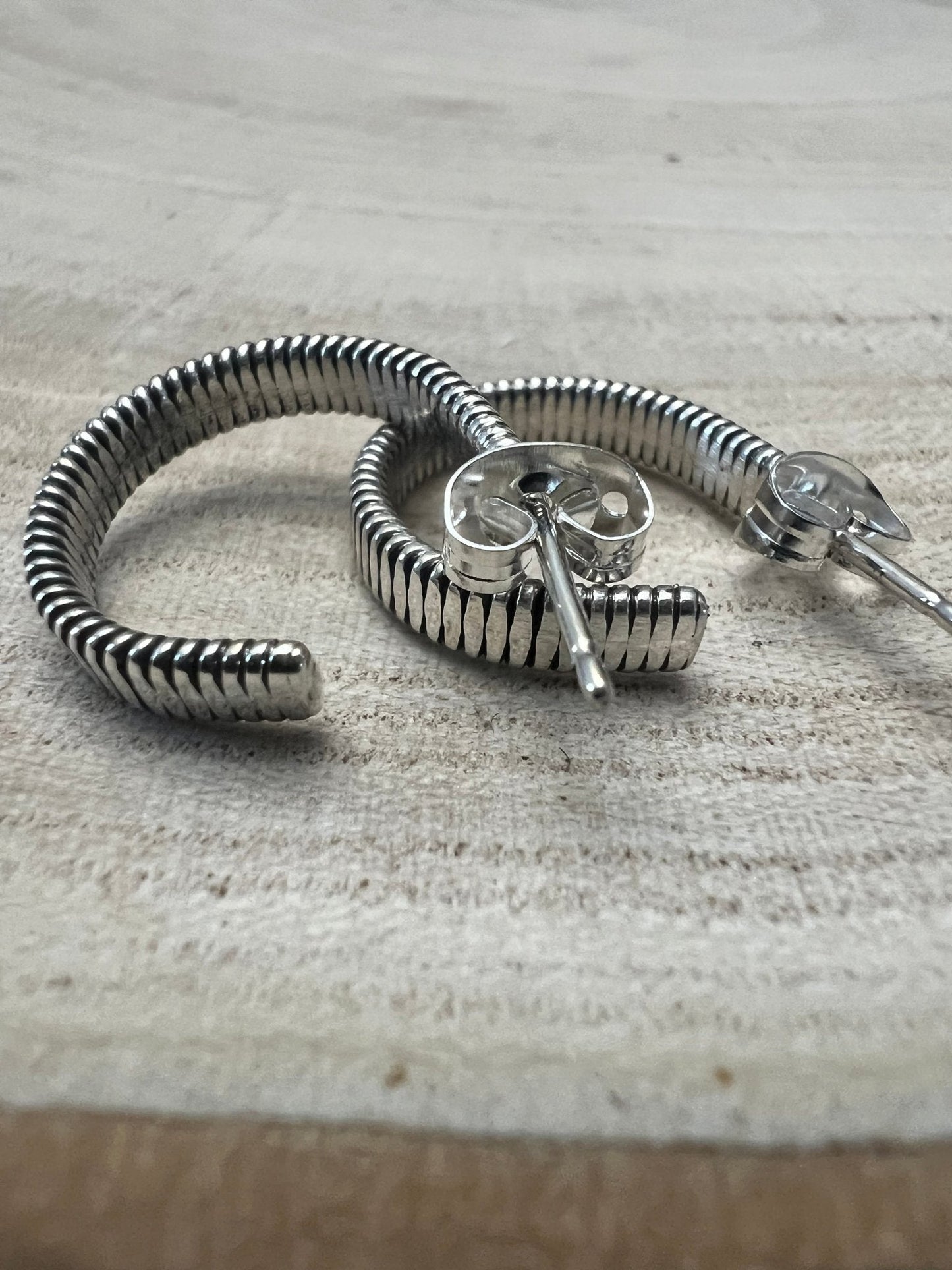 Elaine Tahe Navajo Sterling Silver Hoop Earrings — 5/8" × 1/8" (Listing #1)