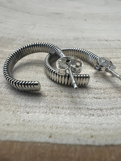 Elaine Tahe Navajo Sterling Silver Hoop Earrings — 5/8" × 1/8" (Listing #1)