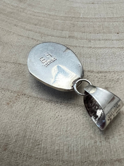 Ernest Hawthorne Navajo Sterling Silver Pendant with White Buffalo — 1 1/2" × 5/8" (Hallmark EH)