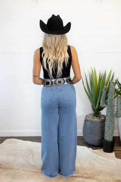 O2 Denim Front Seam Wide-Leg Western Jeans — Light Wash Mid-Rise Flare with Raw Hem & Front Seam Detail